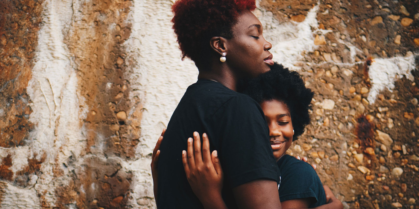 mother and daughter hugging